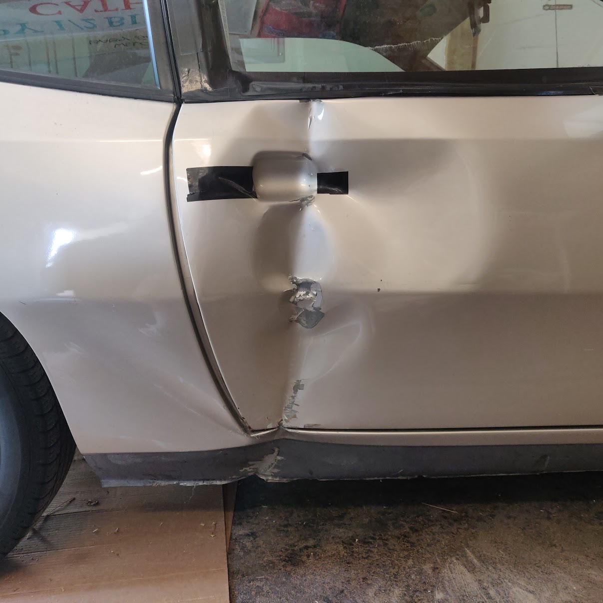 First major hurdle - accidental offroading. But at this point, I was confident and stubborn. I hadn't admitted defeat yet and I wasn't going to let a door stop me from working on my own damn car.