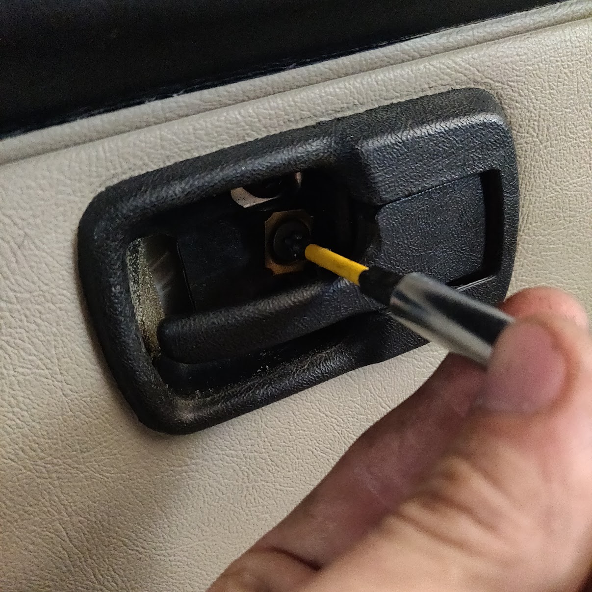 Finally buttoning up the door card and interior release handle.